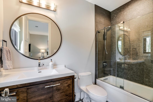 1544 Forest Villa Ln, Mclean, VA 22101 - bathroom featuring vanity, toilet, and bath / shower combo with glass door