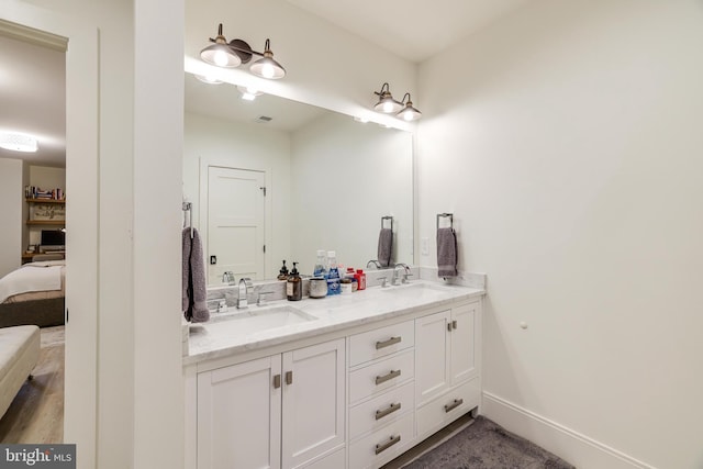 1544 Forest Villa Ln, Mclean, VA 22101 - ensuite bathroom with double vanity and baseboards