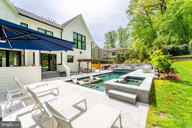 1544 Forest Villa Ln, Mclean, VA 22101 - swimming pool featuring an in-ground hot tub, a patio, and a lawn