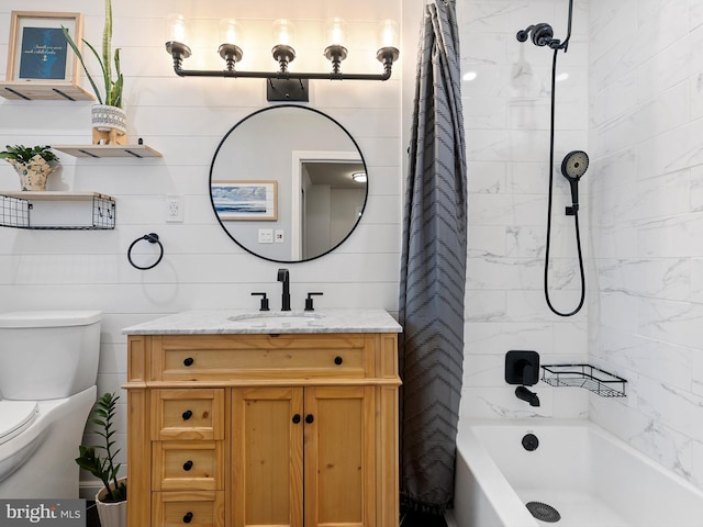full bath with toilet, shower / bath combo, and vanity