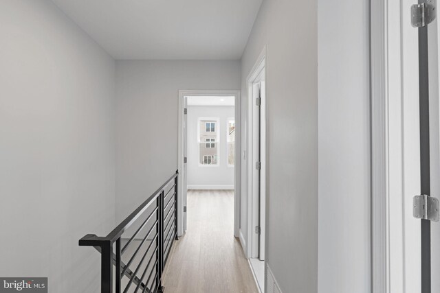 1404 S Patton St, Philadelphia, PA 19146 - hall featuring baseboards, an upstairs landing, and light wood finished floors