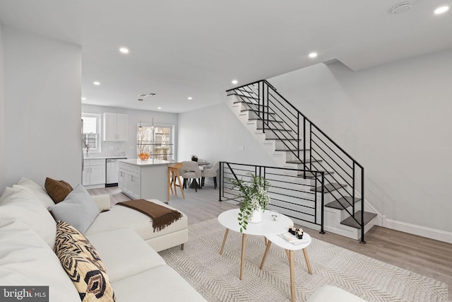 1404 S Patton St, Philadelphia, PA 19146 - living area with baseboards, stairs, recessed lighting, and light wood-type flooring