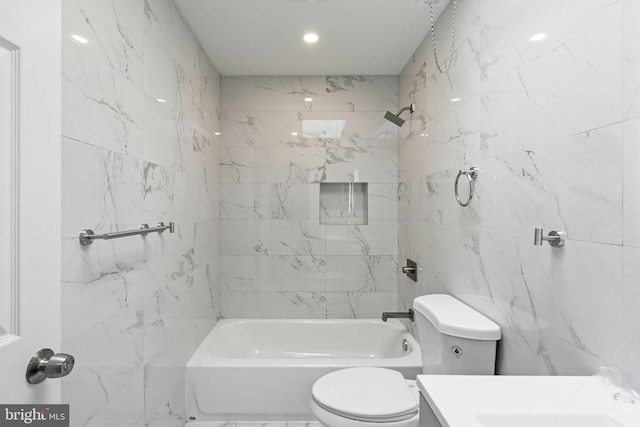 1404 S Patton St, Philadelphia, PA 19146 - bathroom featuring toilet, vanity, shower / tub combination, and tile walls