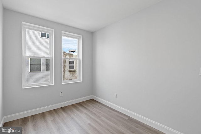 1404 S Patton St, Philadelphia, PA 19146 - spare room with light wood-style flooring and baseboards
