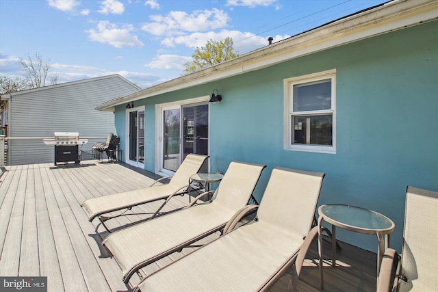 wooden terrace with grilling area