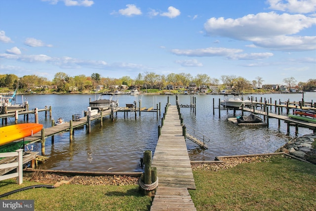 dock area featuring boat lift and a water view