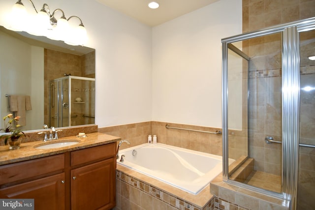 20559 Crescent Pointe Pl, Ashburn, VA 20147 - full bath with a bath, a shower stall, vanity, and recessed lighting
