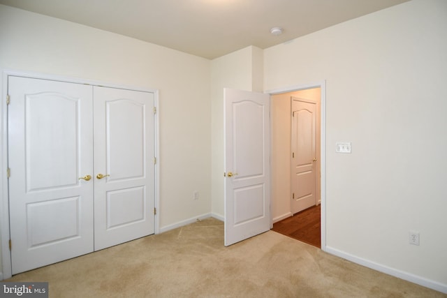 20559 Crescent Pointe Pl, Ashburn, VA 20147 - unfurnished bedroom featuring carpet floors, baseboards, and a closet