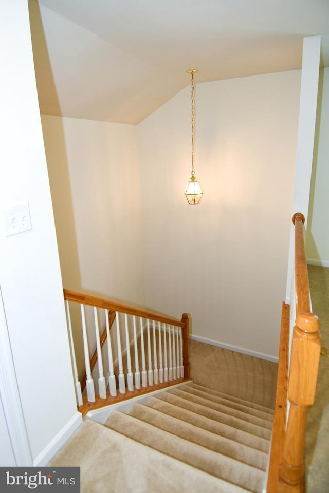 20559 Crescent Pointe Pl, Ashburn, VA 20147 - stairway with carpet, baseboards, and lofted ceiling