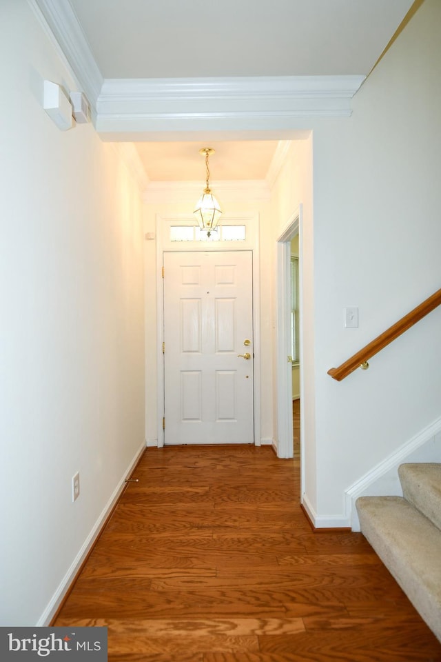 20559 Crescent Pointe Pl, Ashburn, VA 20147 - entryway featuring ornamental molding, stairs, wood finished floors, and baseboards