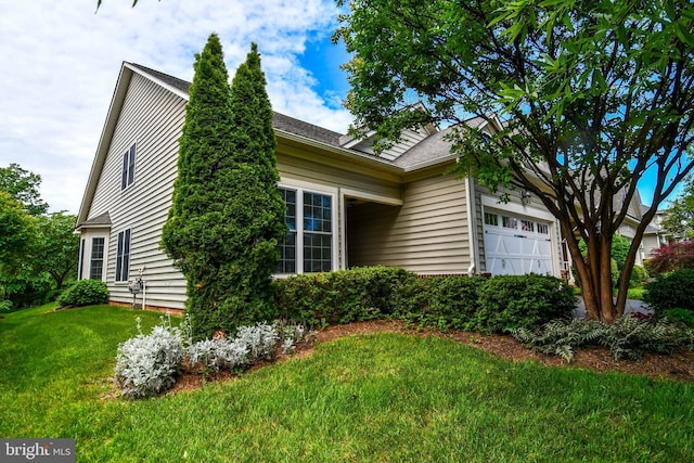 20559 Crescent Pointe Pl, Ashburn, VA 20147 - view of property exterior featuring a garage, a lawn, and roof with shingles
