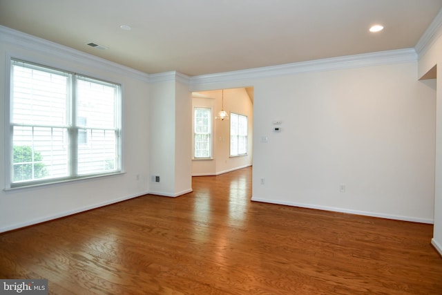 20559 Crescent Pointe Pl, Ashburn, VA 20147 - empty room with crown molding, wood finished floors, and baseboards