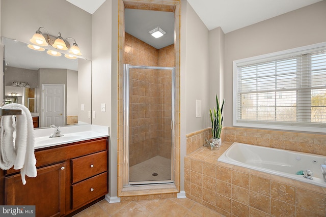 304 S Heron Gull Ct, Ocean City, MD 21842 - full bathroom with a bath, a stall shower, tile patterned floors, and vanity