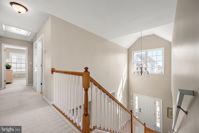 304 S Heron Gull Ct, Ocean City, MD 21842 - interior space with baseboards, vaulted ceiling, carpet floors, and a chandelier