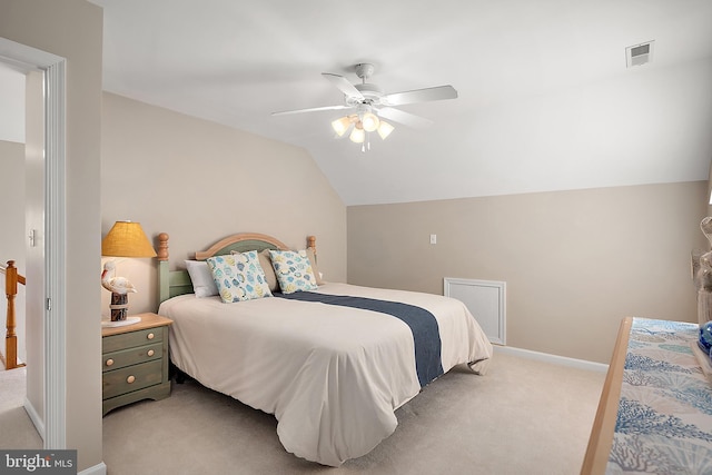 304 S Heron Gull Ct, Ocean City, MD 21842 - bedroom featuring vaulted ceiling, baseboards, visible vents, a ceiling fan, and light carpet