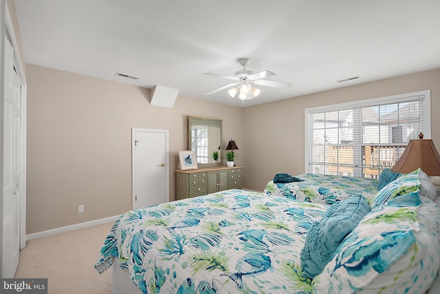 304 S Heron Gull Ct, Ocean City, MD 21842 - bedroom with light colored carpet, visible vents, multiple windows, and baseboards