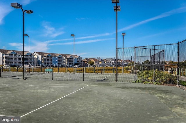 304 S Heron Gull Ct, Ocean City, MD 21842 - view of sport court featuring a residential view and fence