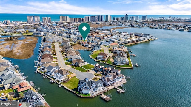 304 S Heron Gull Ct, Ocean City, MD 21842 - drone / aerial view with a water view and a city view