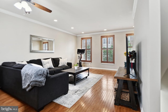 25149 Shultz Ter, Chantilly, VA 20152 - living area with recessed lighting, hardwood / wood-style flooring, crown molding, ceiling fan, and baseboards