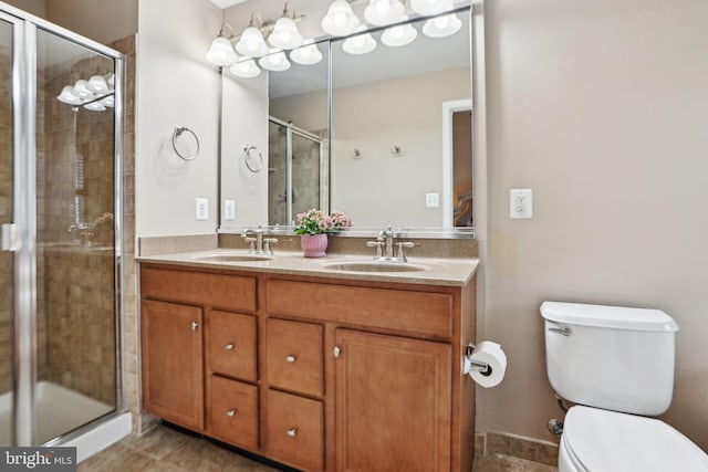 25149 Shultz Ter, Chantilly, VA 20152 - full bath featuring a shower stall, toilet, tile patterned floors, and double vanity