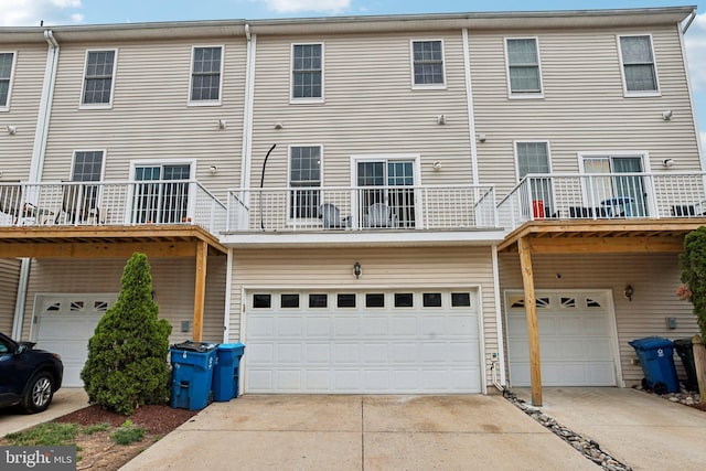 25149 Shultz Ter, Chantilly, VA 20152 - back of property with an attached garage and concrete driveway
