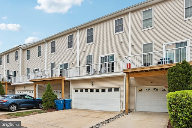 25149 Shultz Ter, Chantilly, VA 20152 - back of property with a garage and concrete driveway