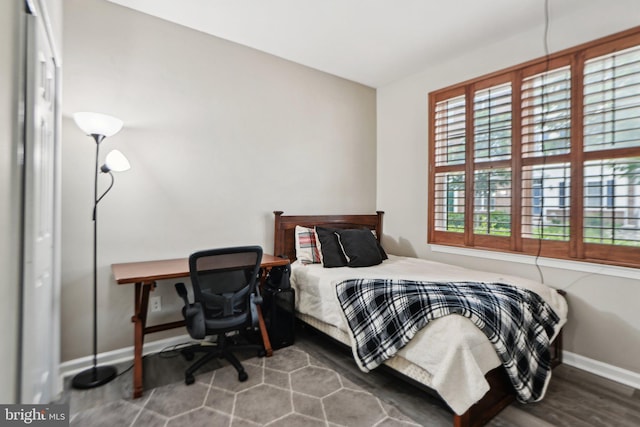 25149 Shultz Ter, Chantilly, VA 20152 - bedroom with baseboards and wood finished floors