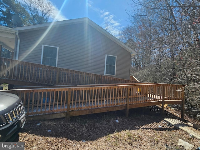 rear view of house with a deck
