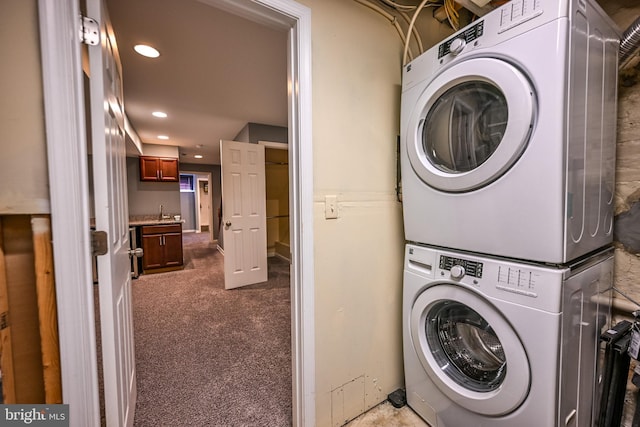 6 N Luzerne Ave, Baltimore, MD 21224 - laundry area with stacked washer / drying machine, recessed lighting, and carpet