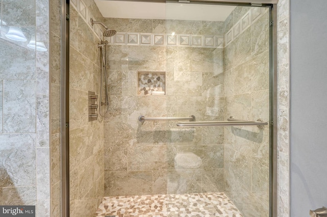 bathroom featuring a stall shower