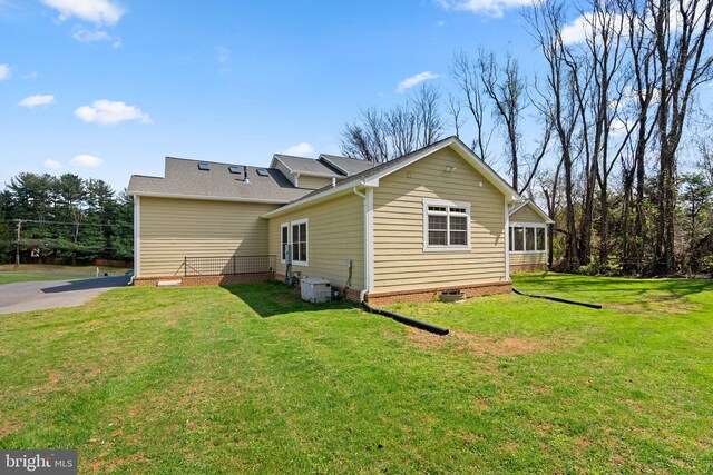 14239 Seneca Rd, Darnestown, MD 20874 - back of house with roof with shingles and a yard