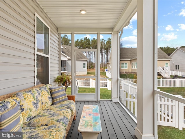 sunroom with a residential view