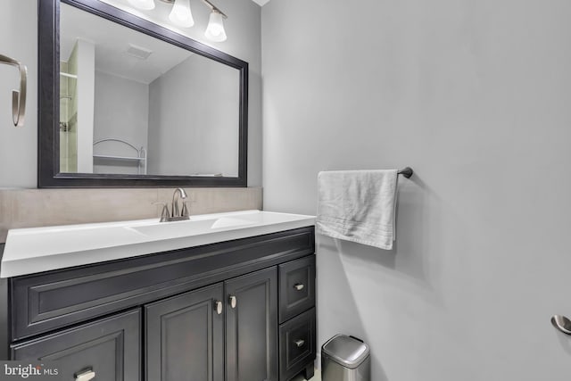 bathroom featuring visible vents and vanity