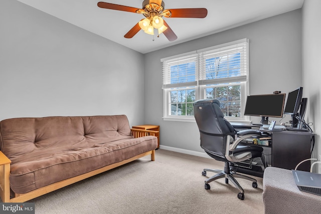 home office featuring baseboards, ceiling fan, and carpet flooring