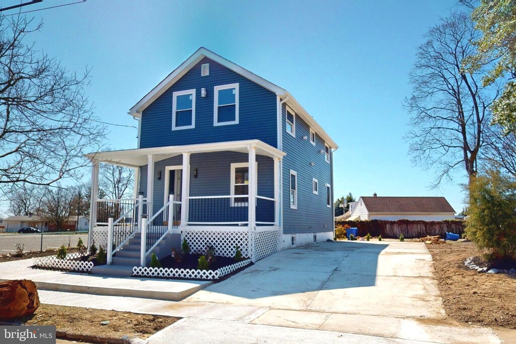 304 Monument Ave, National Park, NJ 08063 - view of front of home featuring covered porch and fence