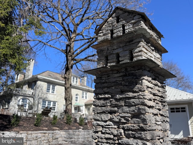 234 W Fairmount Ave, State College, PA 16801 - view of property exterior with a chimney
