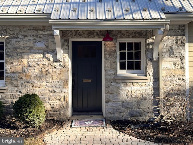 234 W Fairmount Ave, State College, PA 16801 - doorway to property featuring metal roof and stone siding