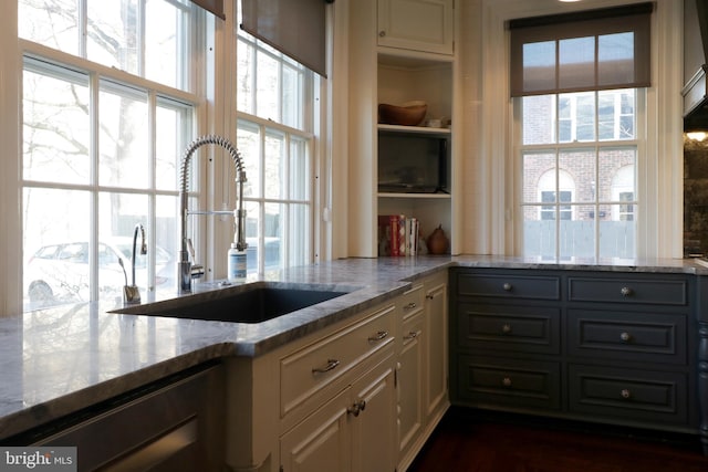 234 W Fairmount Ave, State College, PA 16801 - kitchen featuring a sink, light stone countertops, white cabinets, and gray cabinets