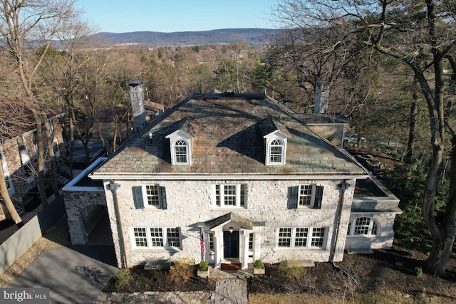 234 W Fairmount Ave, State College, PA 16801 - view of front of home with a chimney and a mountain view