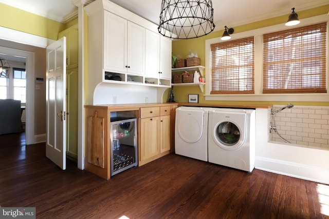 234 W Fairmount Ave, State College, PA 16801 - laundry room featuring wine cooler, washer and clothes dryer, dark wood-style floors, and crown molding
