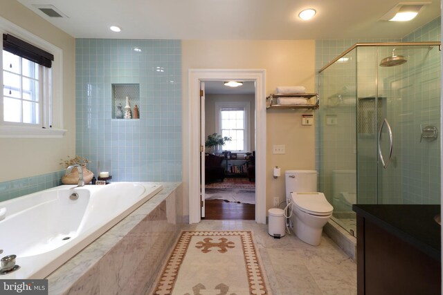 234 W Fairmount Ave, State College, PA 16801 - bathroom featuring a garden tub, a shower stall, toilet, vanity, and tile patterned floors