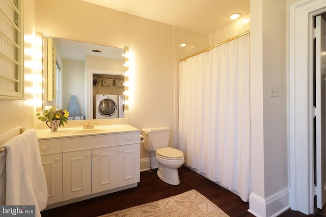 234 W Fairmount Ave, State College, PA 16801 - bathroom with wood finished floors, vanity, toilet, stacked washer / drying machine, and a shower with shower curtain