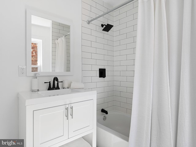 bathroom with shower / bath combo and vanity
