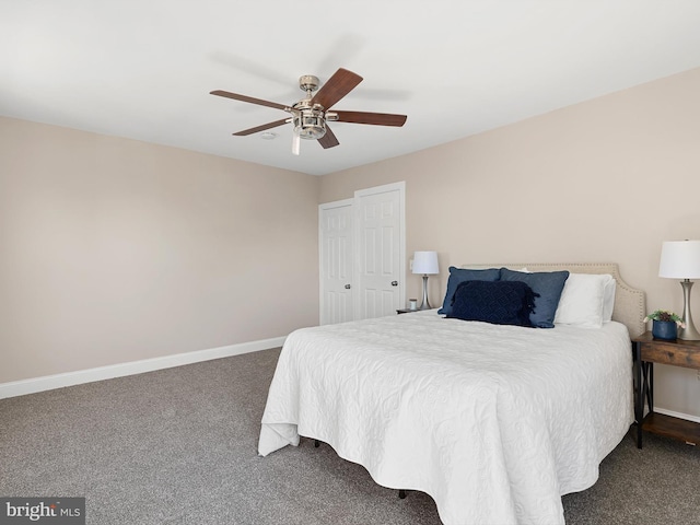 carpeted bedroom featuring baseboards and ceiling fan