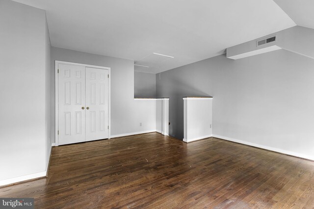 544 N Saint Asaph St, Alexandria, VA 22314 - bonus room featuring wood finished floors, baseboards, and attic access