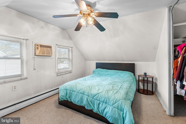 bedroom with a baseboard heating unit, a wall mounted AC, multiple windows, lofted ceiling, and carpet flooring