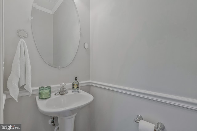 11587 Wollaston Cir, Swan Point, MD 20645 - bathroom with ornamental molding and a sink