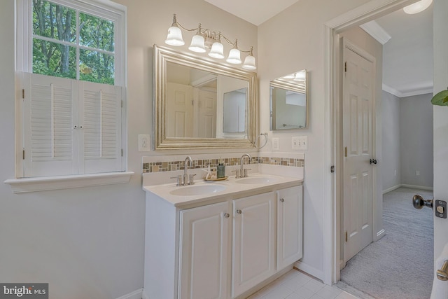 11587 Wollaston Cir, Swan Point, MD 20645 - full bathroom with double vanity, backsplash, baseboards, and tile patterned floors