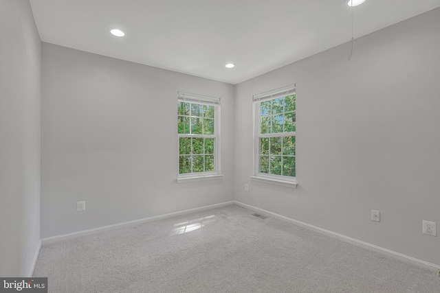 11587 Wollaston Cir, Swan Point, MD 20645 - carpeted spare room featuring baseboards and recessed lighting