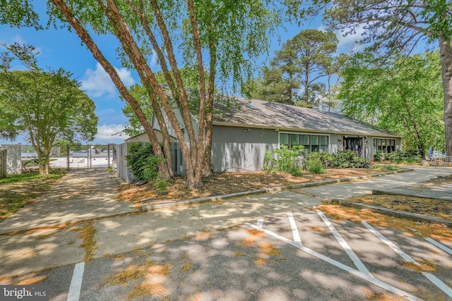 11587 Wollaston Cir, Swan Point, MD 20645 - view of front of property featuring a gate and uncovered parking